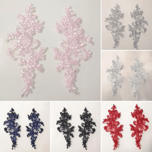A set of six different colored lace appliques.