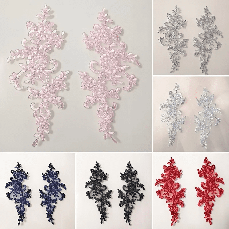 A set of six different colored lace appliques.
