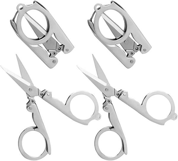 A set of four pairs of scissors are shown.